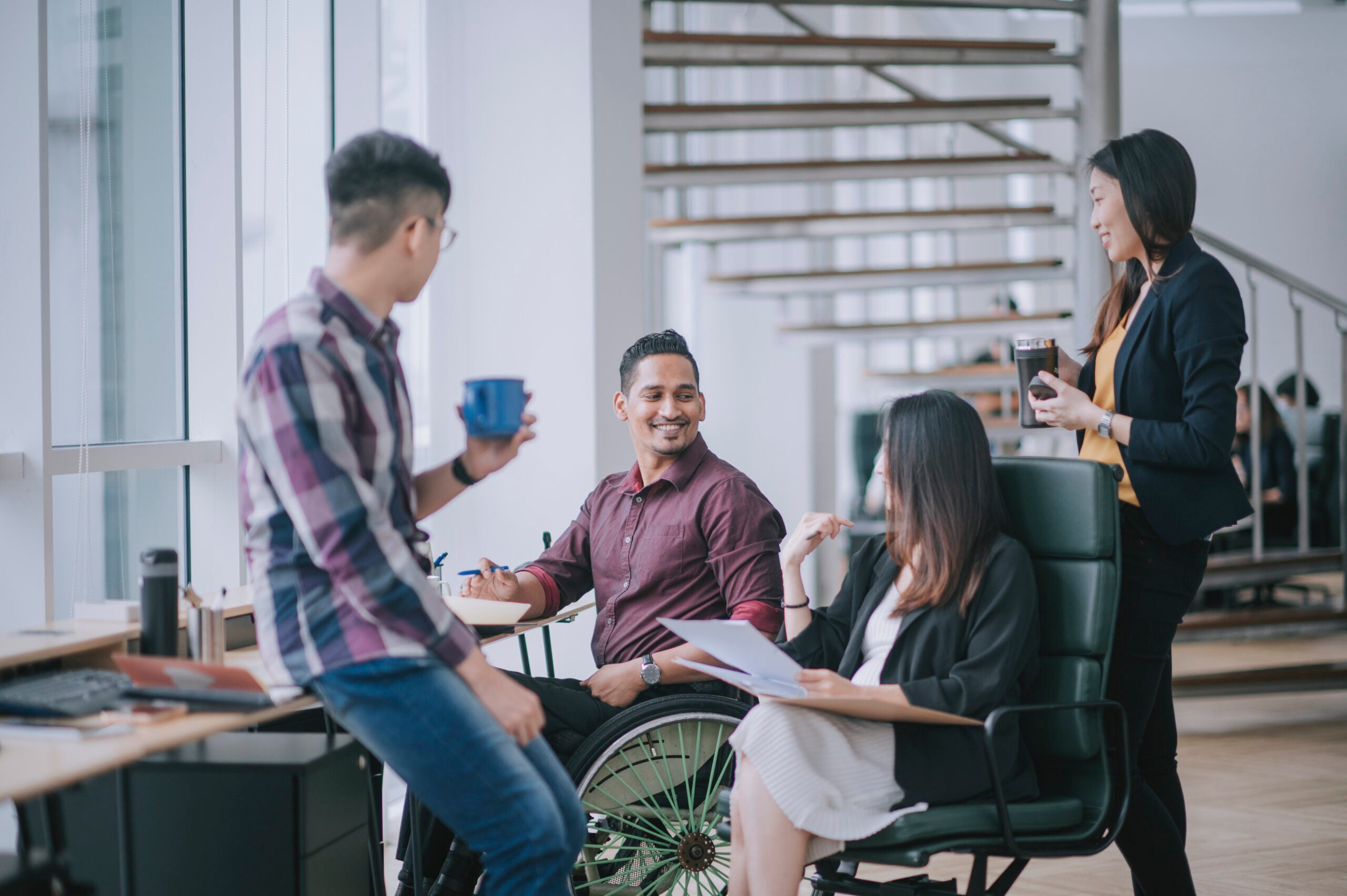 group of employees communicating with each other